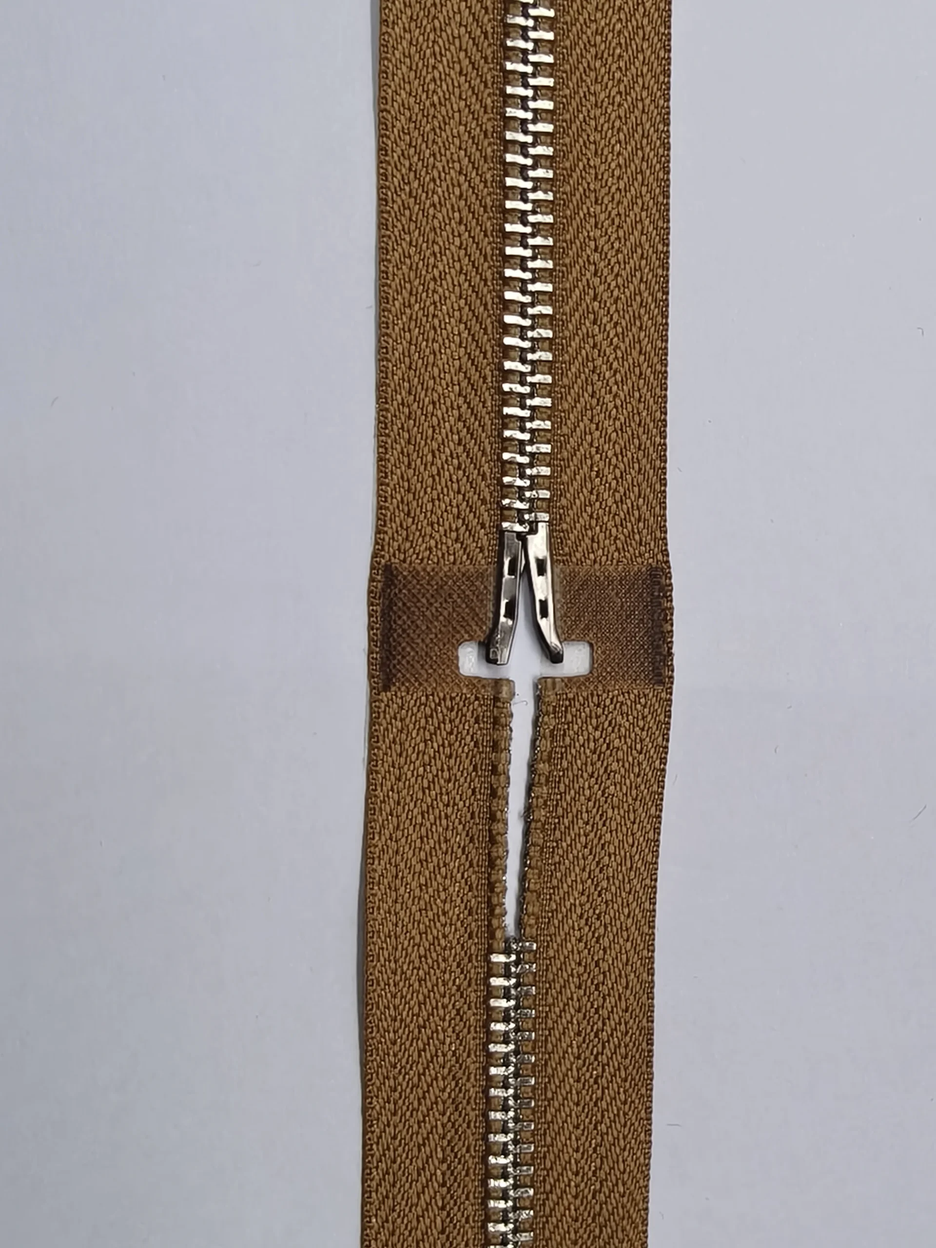 Open-end zipper showing square pin and box installation details